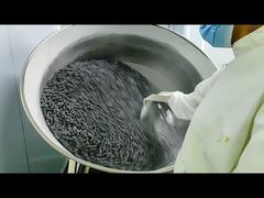 Macchina per il rivestimento di lotti di arachidi